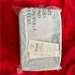 In flight cosmetic pouch set with mirror